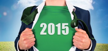Composite image of businessman opening shirt in superhero style